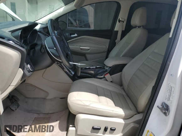 2015 Ford Escape Titanium z VIN 1FMCU9J90FUC41606, wystawiony jako Copart lot #57458455 z przebiegiem 71 671 mil mil oraz Szkoda całkowita • Salvage title. Historia ofert i sprzedaży dostępna na DreamBid. Obrazek 7.