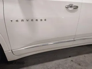 2021 Chevrolet Traverse Premier with VIN 1GNEVKKW7MJ218772, listed as a IAAI auction lot 42306743 with 106,898 mi miles and . Bid and sale history available at DreamBid. Image 6.