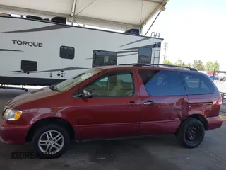 2002 Toyota Sienna LE with VIN 4T3ZF13C02U473719, listed as a IAAI auction lot 42272685 with 301,288 mi miles and . Bid and sale history available at DreamBid. Image 14.