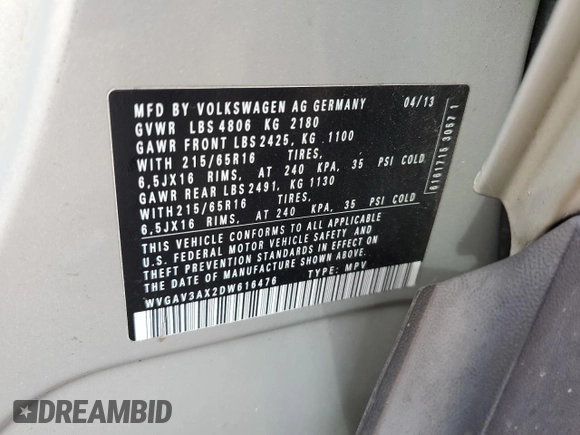 2013 Volkswagen Tiguan S z VIN WVGAV3AX2DW616476, wystawiony jako Copart lot #55313615 z przebiegiem 129 105 mil mil oraz Szkody całkowita. Historia ofert i sprzedaży dostępna na DreamBid. Obrazek 13.