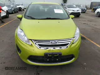 2012 Ford Fiesta SE with VIN 3FADP4BJ3CM159435, listed as a IAAI auction lot 38286404 with 131,808 mi miles and . Bid and sale history available at DreamBid. Image 6.