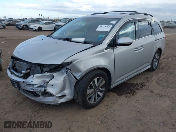 2014 Honda Odyssey Touring with VIN 5FNRL5H93EB066162, listed as a IAAI auction lot 41734783 with 173,063 mi miles and . Bid and sale history available at DreamBid. Image 2.