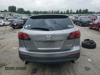 2014 Mazda CX-9 Touring с VIN JM3TB2CA2E0431879, выставлен на аукционе Copart как лот 64778845 с пробегом 145 476 миль миль и Чистый • Clean title. История ставок и продаж доступна на DreamBid. Изображение 6.