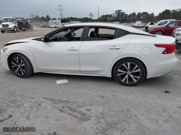 2018 Nissan Maxima SL with VIN 1N4AA6AP7JC371792, listed as a IAAI auction lot 41285671 with 137,517 mi miles. Bid and sale history available at carsss.com. Image 14.