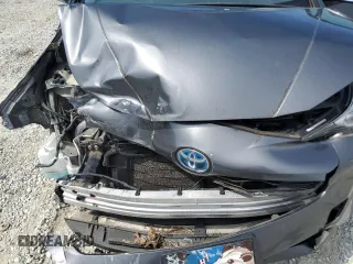 2017 Toyota Prius Two z VIN JTDKBRFU5H3036407, wystawiony jako Copart lot #57320795 z przebiegiem 69 468 mil mil oraz Szkoda całkowita • Salvage title. Historia ofert i sprzedaży dostępna na DreamBid. Obrazek 11.