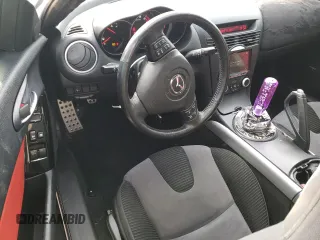 2005 Mazda RX-8 with VIN JM1FE173150149736, listed as a Copart auction lot 87021634 with 90,465 mi miles and Salvage Title. Bid and sale history available at carsss.com. Image 8.