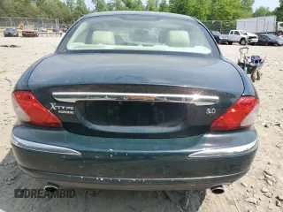 2004 Jaguar X-Type with VIN SAJEA51C64WE17722, listed as a Copart auction lot 55416405 with 89,047 mi miles and Salvage Title. Bid and sale history available at DreamBid. Image 6.