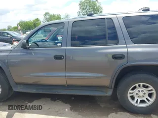 2003 Dodge Durango Sport z VIN 1D4HS38NX3F571790, wystawiony jako IAAI lot #42331620 z przebiegiem 254 130 mil mil oraz . Historia ofert i sprzedaży dostępna na DreamBid. Obrazek 14.