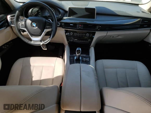 2016 BMW X6 sDrive35i with VIN 5UXKU0C5XG0F92975, listed as a Copart auction lot 74890804 with 64,231 mi miles and Salvage Title. Bid and sale history available at carsss.com. Image 8.
