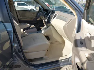 2006 Toyota Highlander with VIN JTEGP21AX60100267, listed as a IAAI auction lot 41440993 with 264,226 mi miles. Bid and sale history available at carsss.com. Image 5.
