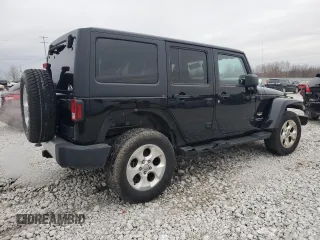 2015 Jeep Wrangler Unlimited Sahara with VIN 1C4BJWEGXFL606573, listed as a Copart auction lot 83983894 with 103,314 mi miles and Clean title. Bid and sale history available at DreamBid. Image 3.
