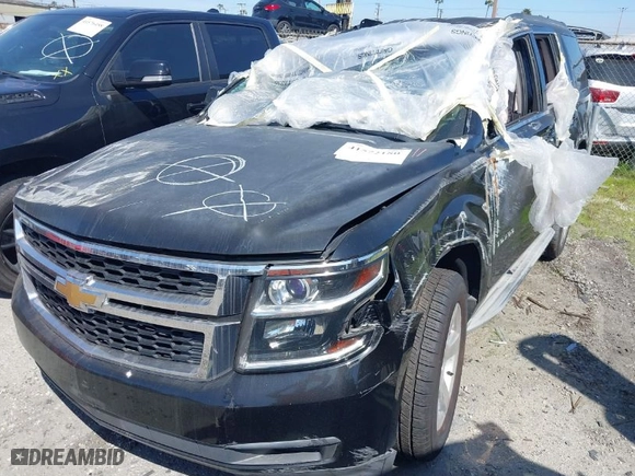2015 Chevrolet Tahoe LT with VIN 1GNSCBKC6FR615554, listed as a IAAI auction lot 41572180 with 170,755 mi miles. Bid and sale history available at carsss.com. Image 2.
