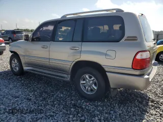 1999 Lexus LX 470 z VIN JT6HT00W1X0045075, wystawiony jako Copart lot #55684785 z przebiegiem 168 855 mil mil oraz Szkody całkowita. Historia ofert i sprzedaży dostępna na DreamBid. Obrazek 2.