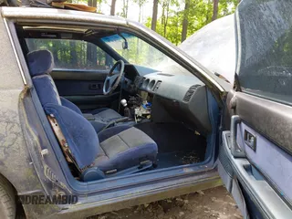 1989 Nissan 300ZX z VIN JN1HZ14S7KX290051, wystawiony jako IAAI lot #42203078 z przebiegiem 136 643 mil mil oraz . Historia ofert i sprzedaży dostępna na DreamBid. Obrazek 5.