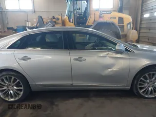 2013 Cadillac XTS Platinum with VIN 2G61V5S31D9190738, listed as a IAAI auction lot 41657461 with 136,924 mi miles and . Bid and sale history available at carsss.com. Image 14.