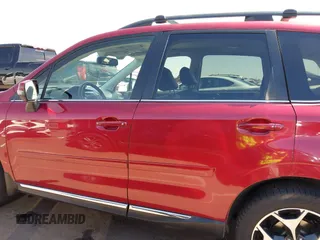 2015 Subaru Forester 2.0XT Touring with VIN JF2SJGWC9FH579887, listed as a IAAI auction lot 41999214 with 147,882 mi miles. Bid and sale history available at carsss.com. Image 15.