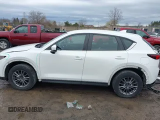 2019 Mazda CX-5 Sport with VIN JM3KFBBM2K0629966, listed as a IAAI auction lot 41953702 with 48,496 mi miles and . Bid and sale history available at DreamBid. Image 15.
