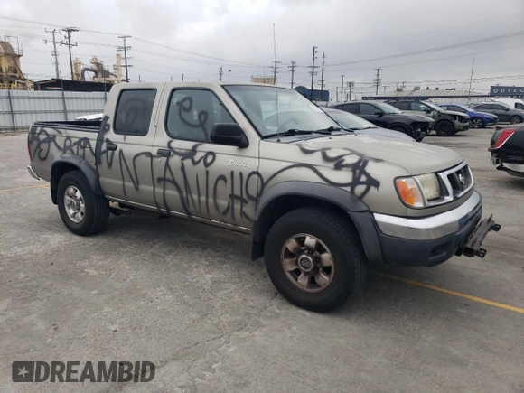 2000 Nissan Frontier XE with VIN 1N6ED27T8YC357939, listed as a Copart auction lot 55727395 with 143,842 mi miles and Salvage title. Bid and sale history available at DreamBid. Image 4.