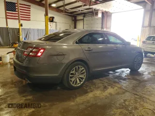 2014 Ford Taurus Limited with VIN 1FAHP2F8XEG113644, listed as a Copart auction lot 51275645 with 143,816 mi miles and Salvage title. Bid and sale history available at DreamBid. Image 3.