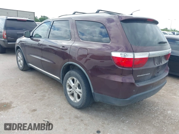 2012 Dodge Durango Crew with VIN 1C4RDHDG7CC144357, listed as a IAAI auction lot 42019204 with 174,408 mi miles and . Bid and sale history available at DreamBid. Image 3.