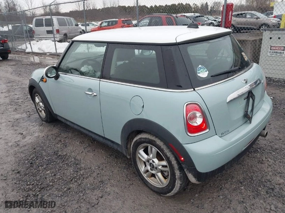 2013 MINI Cooper Hardtop with VIN WMWSU3C51DT686959, listed as a IAAI auction lot 41020389 with 86,770 mi miles. Bid and sale history available at carsss.com. Image 3.