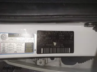 2014 Kia Optima Hybrid LX with VIN KNAGM4AD0E5075798, listed as a IAAI auction lot 41729949 with 150,552 mi miles. Bid and sale history available at carsss.com. Image 9.