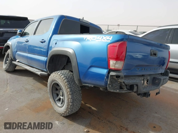 2018 Toyota Tacoma SR with VIN 3TMCZ5AN1JM124111, listed as a IAAI auction lot 41741973 with 90,175 mi miles. Bid and sale history available at carsss.com. Image 3.