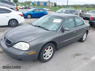 2002 Mercury Sable GS with VIN 1MEFM50U02G614697, listed as a IAAI auction lot 42087379 with 90,209 mi miles. Bid and sale history available at carsss.com. Image 2.