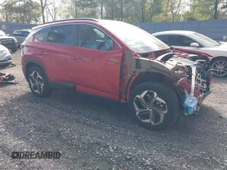 2022 Hyundai Tucson SEL z VIN 5NMJCCAE2NH090105, wystawiony jako IAAI lot #42145889 z przebiegiem 28 636 mil mil oraz . Historia ofert i sprzedaży dostępna na DreamBid. Obrazek 1.