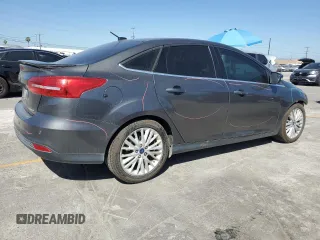 2017 Ford Focus Titanium with VIN 1FADP3J22HL279854, listed as a Copart auction lot 61209135 with 106,323 mi miles and Salvage title. Bid and sale history available at DreamBid. Image 3.
