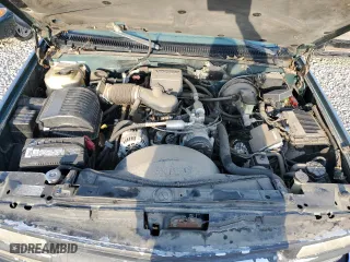 1999 Chevrolet Tahoe Z71 with VIN 1GNEK13R0XJ512661, listed as a Copart auction lot 68022173 with 181,573 mi miles and Salvage Title. Bid and sale history available at carsss.com. Image 11.
