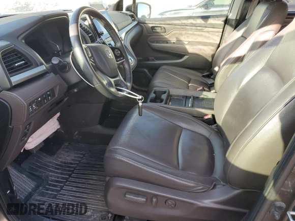 2018 Honda Odyssey Touring с VIN 5FNRL6H8XJB076145, выставлен на аукционе Copart как лот 51870865 с пробегом 96 486 миль миль и Списание • Salvage title. История ставок и продаж доступна на DreamBid. Изображение 7.