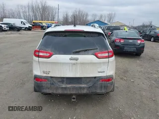 2015 Jeep Cherokee North with VIN 1C4PJMCS6FW564435, listed as a IAAI auction lot 41992440 with 166,048 mi miles. Bid and sale history available at carsss.com. Image 16.