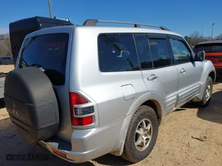 2002 Mitsubishi Montero LTD with VIN JA4MW51R22J069032, listed as a IAAI auction lot 41664411 with 278,895 mi miles. Bid and sale history available at carsss.com. Image 4.