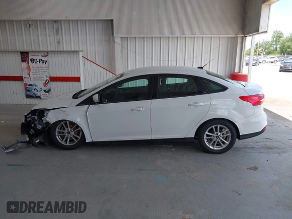 2017 Ford Focus SE with VIN 1FADP3F2XHL342823, listed as a IAAI auction lot 42496940 with 97,263 mi miles and . Bid and sale history available at DreamBid. Image 14.