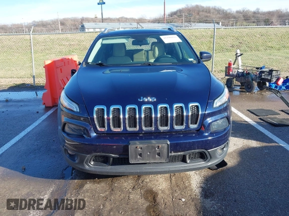 2015 Jeep Cherokee Latitude with VIN 1C4PJMCS0FW583658, listed as a IAAI auction lot 41106819 with 101,849 mi miles. Bid and sale history available at carsss.com. Image 12.