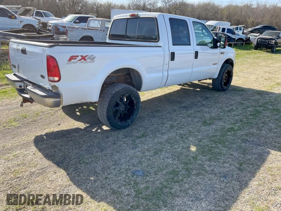 2004 Ford F-350 XL with VIN 1FTSW31P54EB26772, listed as a Copart auction lot 56300325 with 210,944 mi miles and Clean Title. Bid and sale history available at DreamBid. Image 4.