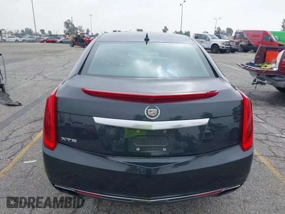 2013 Cadillac XTS Luxury with VIN 2G61P5S33D9215214, listed as a IAAI auction lot 42170402 with 132,045 mi miles and . Bid and sale history available at DreamBid. Image 16.