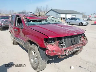 2004 Jeep Grand Cherokee Laredo z VIN 1J4GW48S34C289321, wystawiony jako IAAI lot #42062819 z przebiegiem Nie podano mil oraz . Historia ofert i sprzedaży dostępna na DreamBid. Obrazek 1.