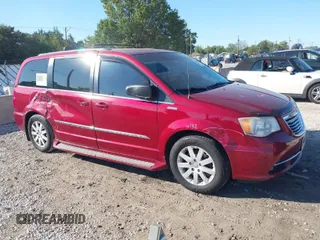 2014 Chrysler Town & Country Touring with VIN 2C4RC1BG9ER157652, listed as a IAAI auction lot 40449592 with 156,131 mi miles. Bid and sale history available at carsss.com. Image 1.