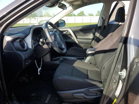 2018 Toyota RAV4 XLE with VIN 2T3WFREV0JW517488, listed as a Copart auction lot 51000975 with 68,105 mi miles and Salvage title. Bid and sale history available at DreamBid. Image 7.