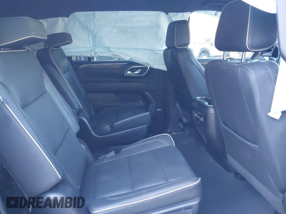 2023 Chevrolet Suburban Premier with VIN 1GNSKFKD3PR263697, listed as a IAAI auction lot 41903910 with 31,574 mi miles and . Bid and sale history available at DreamBid. Image 8.