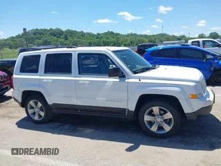 2014 Jeep Patriot Latitude z VIN 1C4NJPFB1ED505288, wystawiony jako IAAI lot #42118356 z przebiegiem 146 615 mil mil oraz . Historia ofert i sprzedaży dostępna na DreamBid. Obrazek 14.