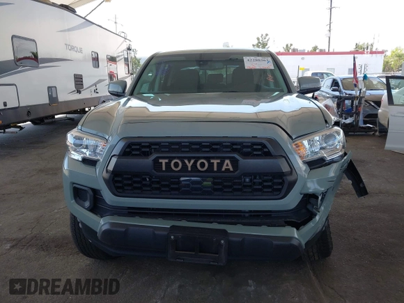 2022 Toyota Tacoma SR with VIN 3TMCZ5ANXNM479025, listed as a IAAI auction lot 42280363 with 29,650 mi miles and . Bid and sale history available at DreamBid. Image 12.