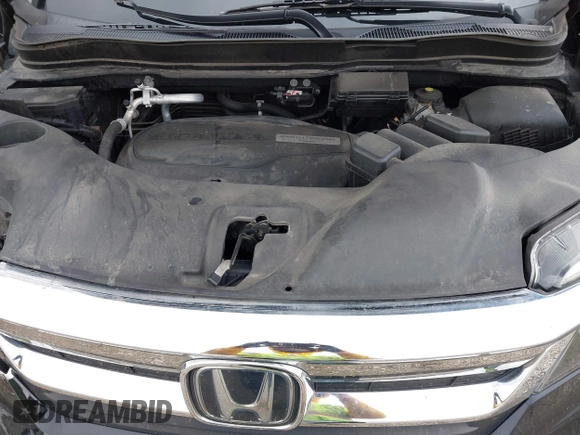 2020 Honda Pilot EX-L with VIN 5FNYF6H57LB059332, listed as a IAAI auction lot 42614422 with 110,279 mi miles and . Bid and sale history available at DreamBid. Image 10.