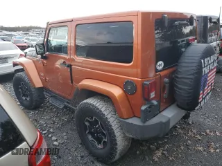 2011 Jeep Wrangler Sahara with VIN 1J4GA5D11BL627667, listed as a Copart auction lot 87227054 with 124,009 mi miles and Clean Title. Bid and sale history available at DreamBid. Image 2.