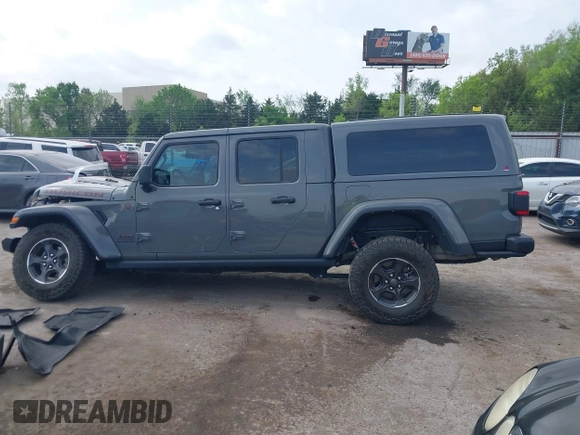 2021 Jeep Gladiator Rubicon with VIN 1C6JJTBG8ML619972, listed as a IAAI auction lot 42057805 with 37,875 mi miles and . Bid and sale history available at DreamBid. Image 15.