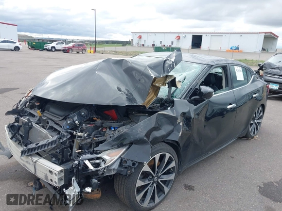 2016 Nissan Maxima SR z VIN 1N4AA6AP9GC386237, wystawiony jako IAAI lot #42166280 z przebiegiem 130 091 mil mil oraz . Historia ofert i sprzedaży dostępna na DreamBid. Obrazek 18.