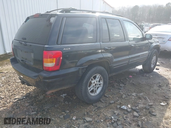 1999 Jeep Grand Cherokee Limited with VIN 1J4GW68S8XC588500, listed as a IAAI auction lot 41484787 with 161,961 mi miles. Bid and sale history available at carsss.com. Image 4.