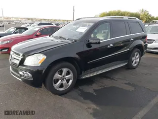 2011 Mercedes-Benz GL-Class GL 450 with VIN 4JGBF7BE1BA752615, listed as a IAAI auction lot 41075508 with 165,605 mi miles. Bid and sale history available at carsss.com. Image 2.
